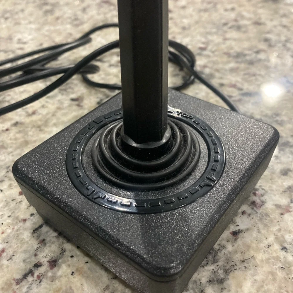 Atari joy stick with left hand adapter Preowned good working condition